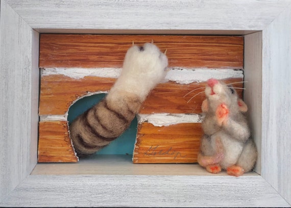 mouse and cat paw "Mercy!"