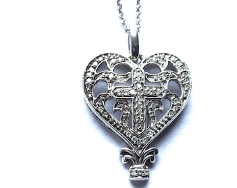 Sterling diamond heart with cross pendant 50 natural diamonds with 18” Rolo chain