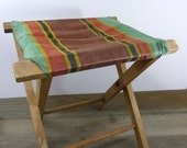 Vintage wood and canvas folding camp stool