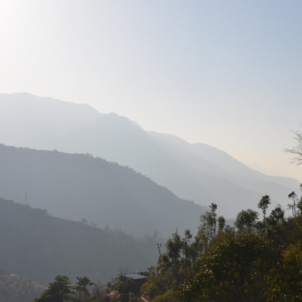 Kathmandu sits in a valley surrounded by steep mountains. The foothills surrounding the valley are very picturesque in the late afternoon.