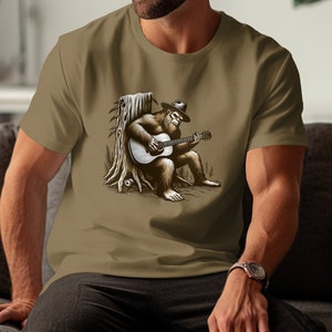 Bigfoot Playing Guitar Forest Scene T-Shirt, Blue Grass Player Shirt, Sasquatch Music Shirt, Music Lover Graphic Tee