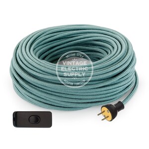 May include: A roll of teal blue electrical cord with a black in-line switch and a black and gold plug. The cord is labeled "Antique Style Vintage Electric Supply Modern Function".