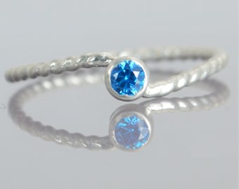 Wave Ring, Silver Wave Ring, Blue Zircon Mothers Ring, December Birthstone Ring, Silver Twist Ring, Unique Mother's Ring, Blue Zircon Ring