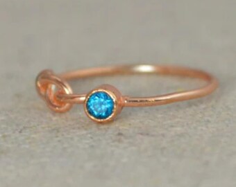 Blue Zircon Infinity Ring, Rose Gold Filled Ring, Stackable Rings, Mothers Ring, December Birthstone, Rose Gold Ring, Rose Gold Knot Ring