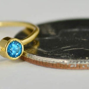 14k Blue Zircon Infinity Ring, 14k Gold Ring, Stackable Rings, Mother's Ring, December Birthstone Ring, Gold Infinity Ring, Gold Knot Ring image 4