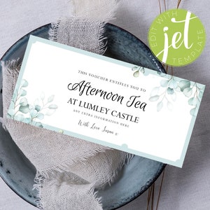 May include: A light blue voucher with a white border and a watercolor design of eucalyptus leaves. The voucher says "THIS VOUCHER ENTITLES YOU TO Afternoon Tea AT LUMLEY CASTLE ANY EXTRA INFORMATION HERE With Love Susan x"