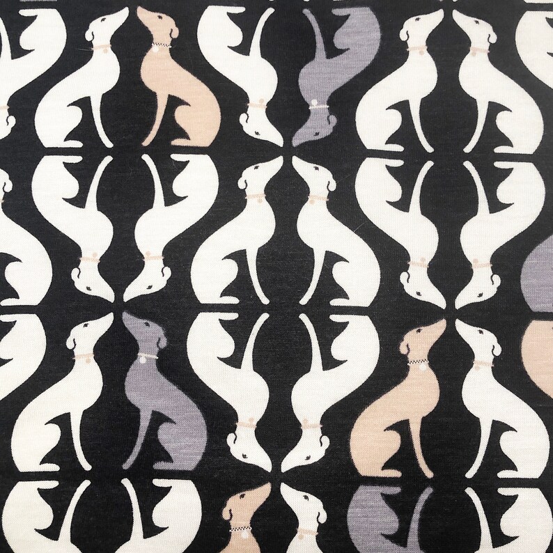 May include: A repeating pattern of stylized dog silhouettes in white, gray, and tan against a black background. Each dog is wearing a collar. The design is symmetrical and creates a visually interesting textile pattern.