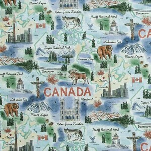 May include: Fabric with a map of Canada featuring landmarks, wildlife, and the word "CANADA" in large letters. Includes illustrations of bears, moose, and the CN Tower. The background is a light blue with green and brown accents.