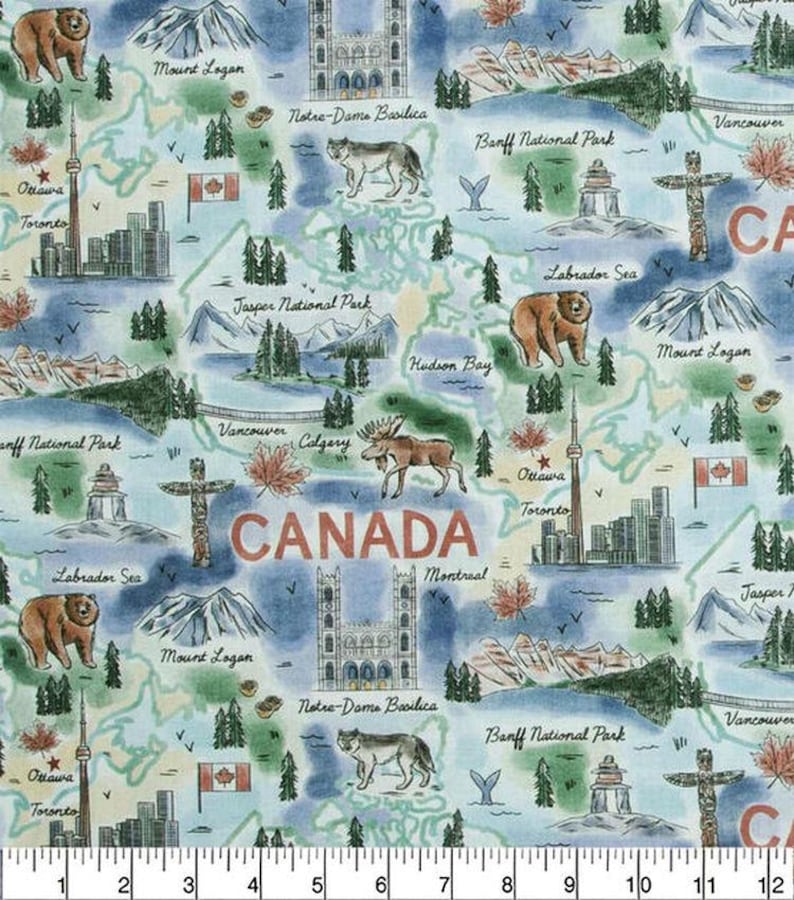 May include: Fabric with a map of Canada featuring landmarks, wildlife, and the word "CANADA" in large letters. Includes illustrations of bears, moose, and the CN Tower. The background is a light blue with green and brown accents.