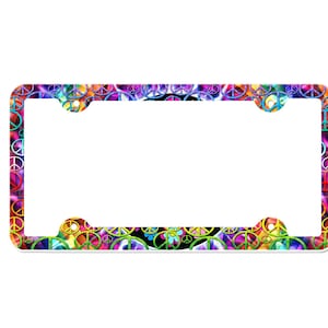 May include: A colorful license plate frame with a peace sign pattern. The frame is made of plastic and has a white background with a variety of colors, including pink, purple, blue, green, and yellow. The peace signs are all different sizes and are arranged in a random pattern.