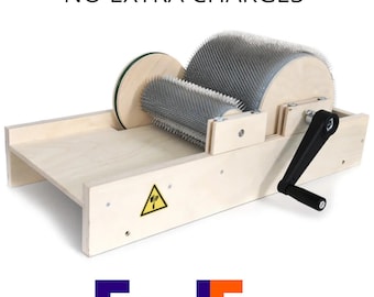 May include: A light-coloured wooden drum carder featuring two metal-bristled rollers, a black hand crank, and a yellow triangular warning label. The text FREE DELIVERY NO EXTRA CHARGES and the FedEx logo are visible above and below the device.