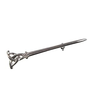 May include: A silver-toned kilt pin with a Celtic knot design at the top and a long, pointed pin. The pin is a traditional accessory, often used to secure kilts or other garments. The design is intricate and detailed.