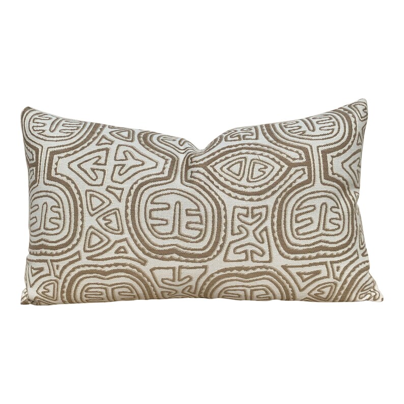Sunbrella Woven Outdoor Indoor Ethnic Pillow in Tan Geometric Outdoor Lumbar Pillow in Beige.