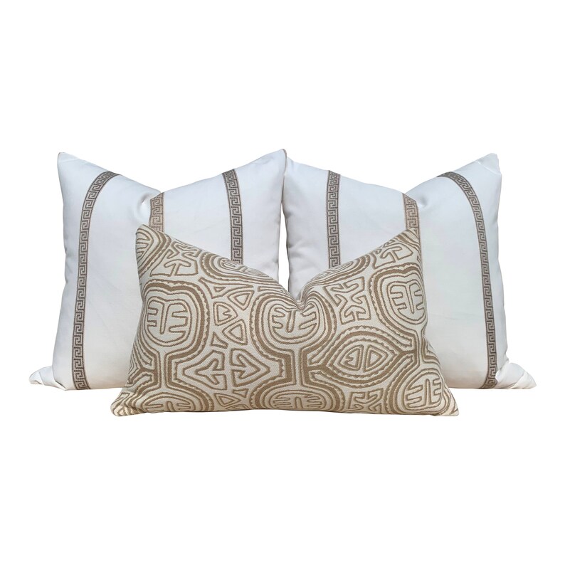 Sunbrella Woven Outdoor Indoor Ethnic Pillow in Tan Geometric Outdoor Lumbar Pillow in Beige.