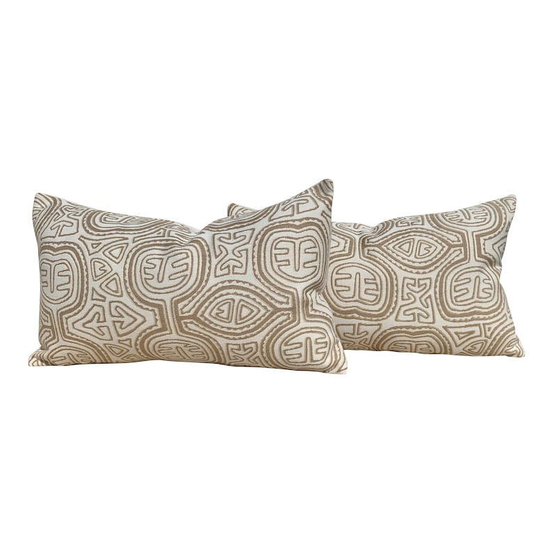 Sunbrella Woven Outdoor Indoor Ethnic Pillow in Tan Geometric Outdoor Lumbar Pillow in Beige.