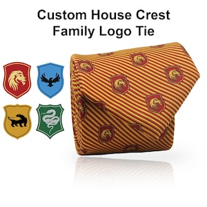 May include: A folded tie with a repeating crest pattern and red and yellow stripes. The crests feature a lion, and the tie is labelled "Custom House Crest Family Logo Tie". Four additional crests are displayed.