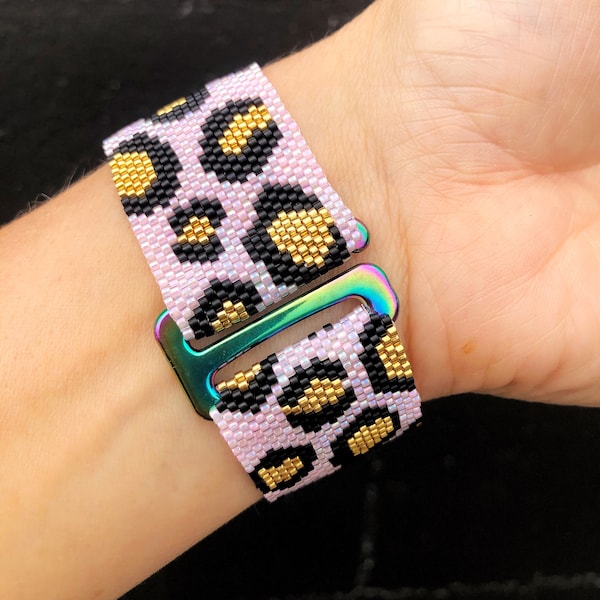 Leopard print Miyuki seedbead bracelet in 24k gold, pink and black on an easy G hook.