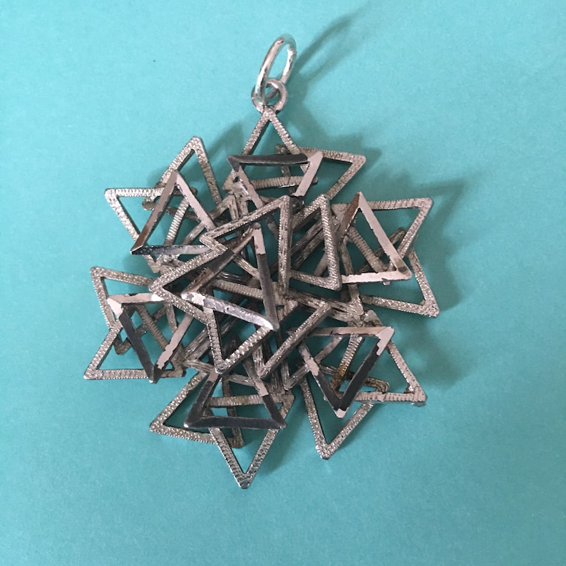 1980s modernistbrutalist costume jewellery pendant On large jumpring A stunning piece