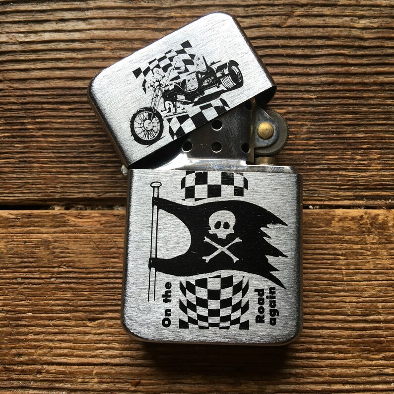 Deadstock tristar petrol lighter with trike decal on thefront