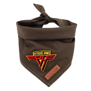 May include: A green bandana with a red, yellow, and black embroidered patch that says "Pethaus Army" and a brown leather patch that says "Pethaus Packmember".