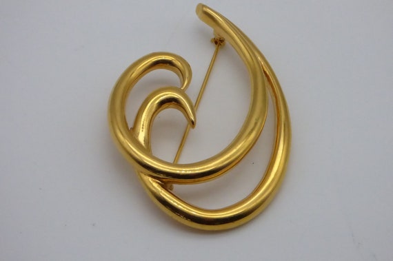 Large gold brooch deals