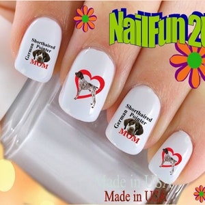 May include: Nail art decals featuring a German Shorthaired Pointer dog with the text "German Shorthaired Pointer Mom" in red and white lettering.