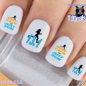 May include: Water slide nail art decals featuring a runner with the text "Keep Calm and Just Run" and "13.1".