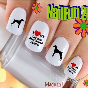 May include: White nail art with black dog silhouettes and the text "I ❤️ MY German Shorthaired Pointer." The image also includes the text "NailFun2U" and "Made in USA."