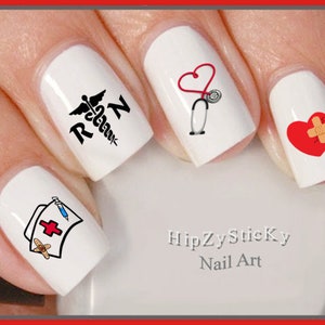 May include: Nail art stickers with a red heart, a stethoscope, a bandage, a nurse's cap, and a medical symbol with the letters "RN". The text "HipZySticKy Nail Art" is also visible.