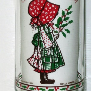 Vintage Holly Hobbie Boże Narodzenie to prezent radości Coca-Cola Promo Character Doll szklanka do picia