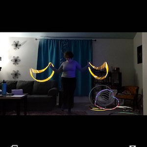 Raye of Rainn, shapes, Shape hoop, hula hoop Single or double cresent moon hoop, refelctive, performance, decorative, bare, taped