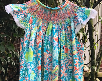 Smocked flamingo print dress