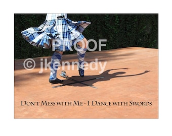 May include: A person wearing a blue and white kilt dances with swords. The caption reads "Don't Mess With Me - I Dance With Swords".