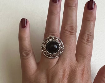 Vintage Sarah Coventry silver tone filigree with black center ring size 5