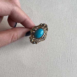 Vintage Vogue gold tone filigree with turquoise cabochon adjustable ring