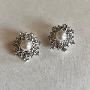 Pendientes vintage de clip con diamantes de imitación en tono plateado «Ultima 1968» de Sarah Coventry