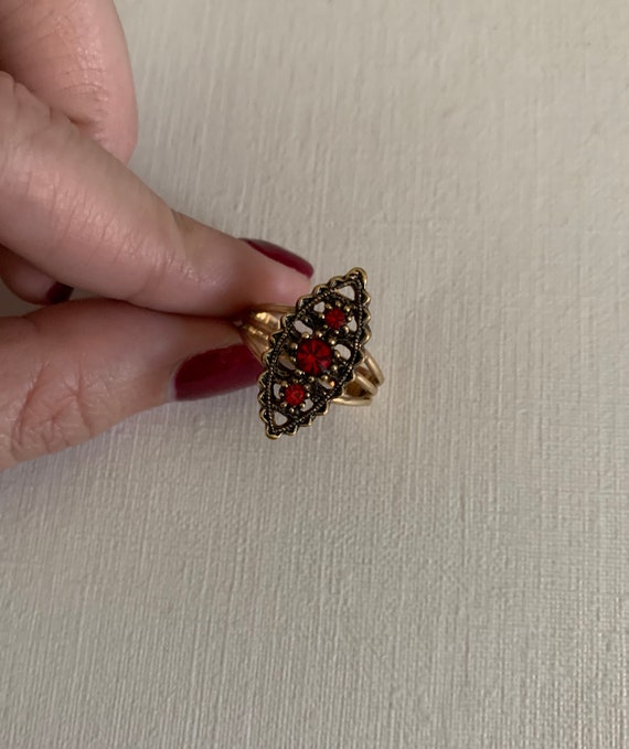 Vintage Sarah Coventry gold tone red rhinestone ad