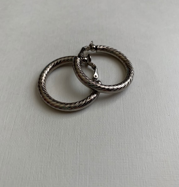 Vintage silver tone striped textured hoop clip on… - image 1