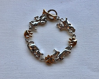 Vintage gold and silver tone cats and dogs toggle bracelet