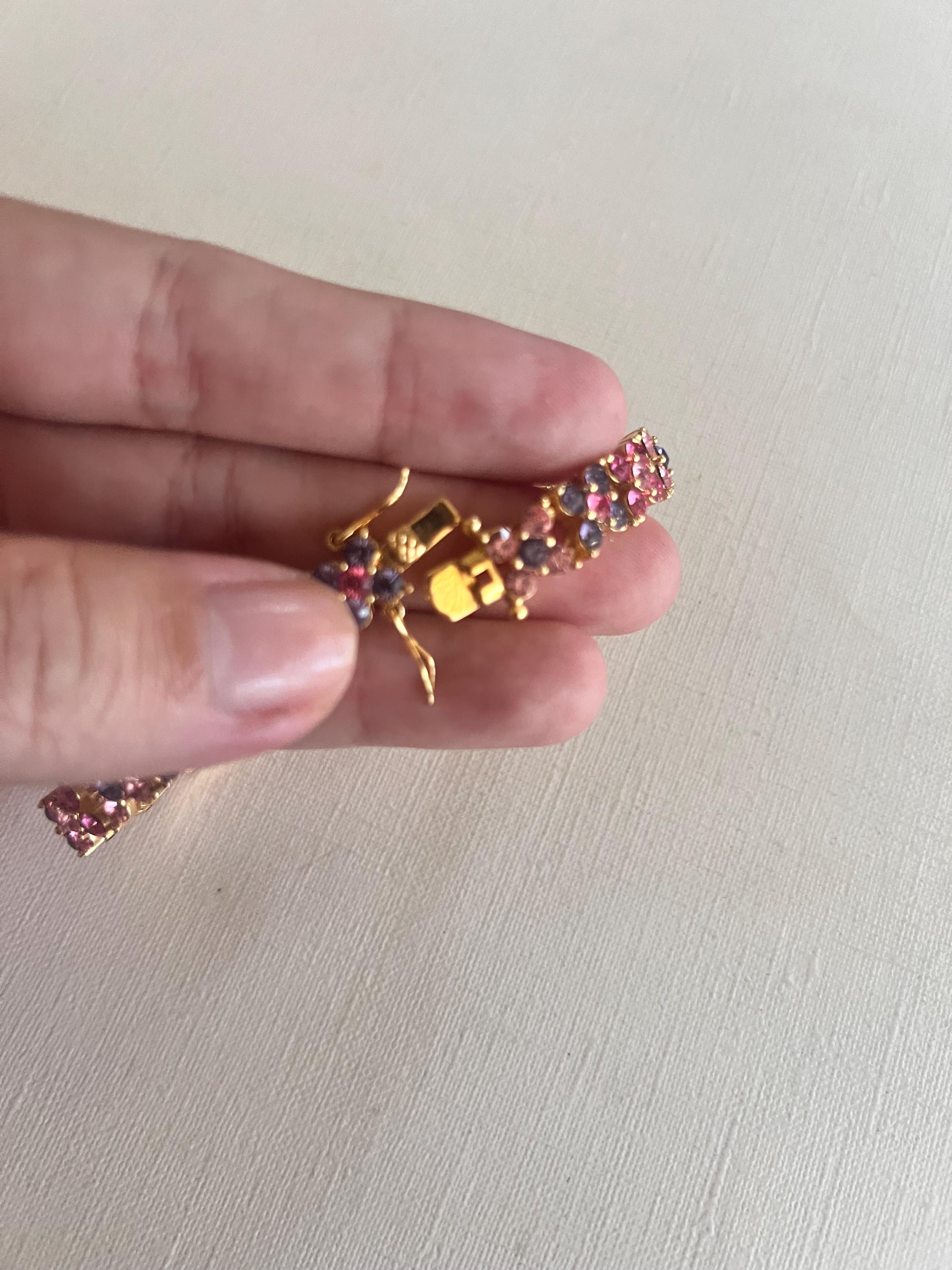 ヴィンテージのジョーン・リバーズのピンクと紫のラインストーン 