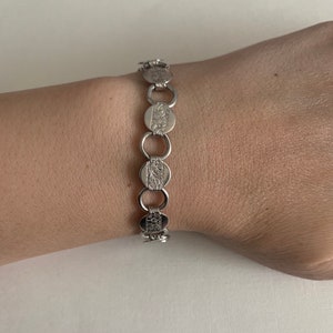 Vintage Sarah Coventry silver tone flower stamped coin minimalist bracelet