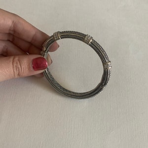 Vintage silver tone textured with rhinestone accents magnetic bangle bracelet