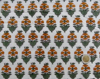 Artisanal cotton fabric, ethnic ochre and green floral pattern printed with stamp