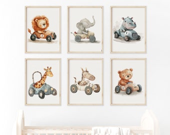 May include: Set of six watercolor illustrations featuring various animals driving vintage race cars. The animals include a lion, elephant, hippopotamus, giraffe, zebra, and bear. Each illustration is framed in a light brown frame.
