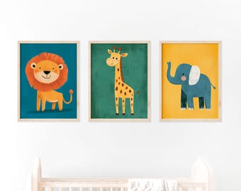 May include: Three framed illustrations of animals. A lion with an orange mane on a blue background, a giraffe with a yellow and orange patterned body on a green background, and an elephant with a blue body on a yellow background.