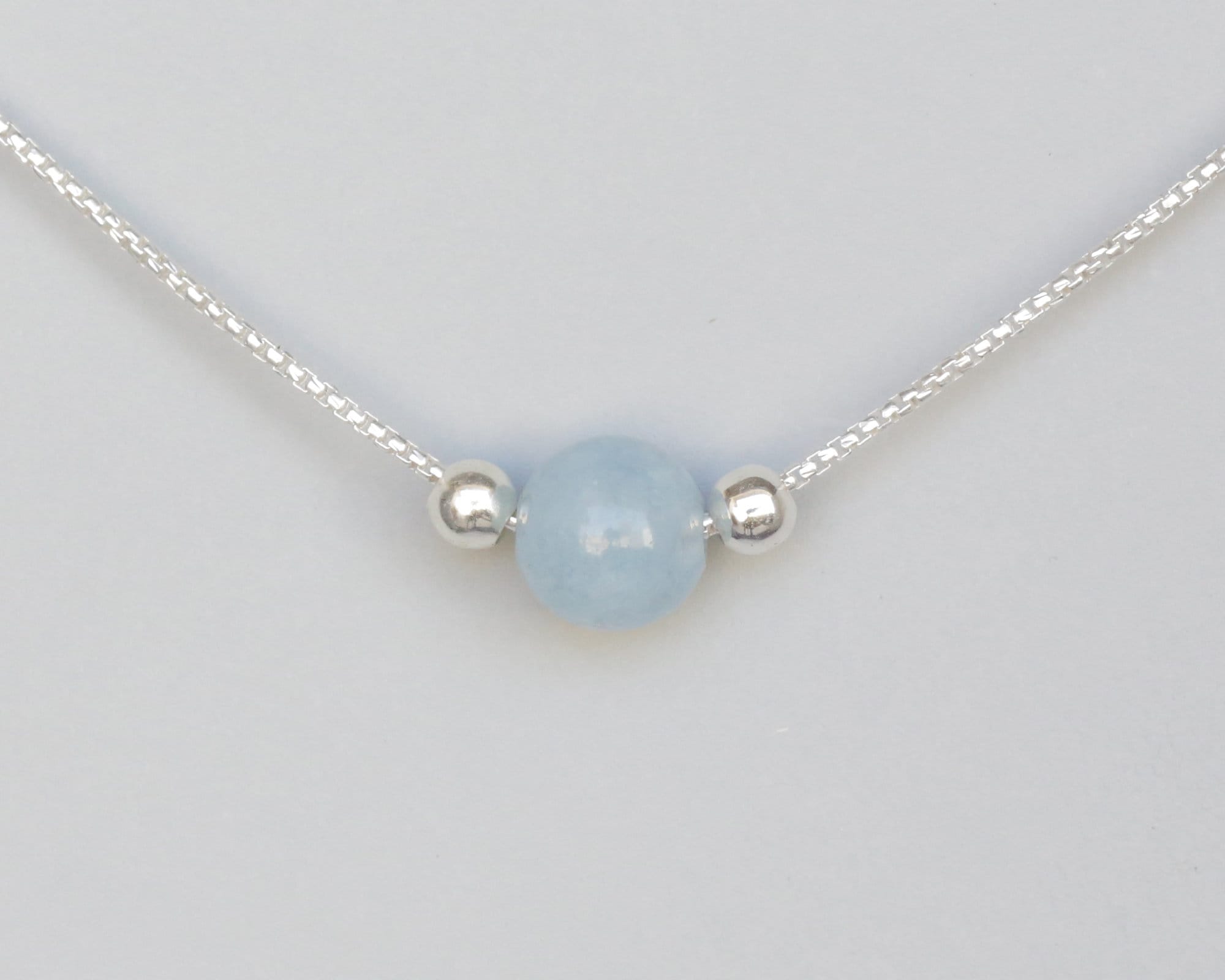 Blue Brazilian Aquamarine Bead Rhodium Over Sterling Silver