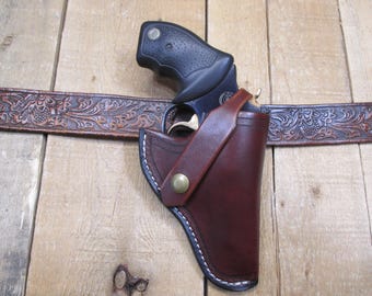TAURUS  22. LONG RIFLE, Leather holster. Fits Taurus 9 Shot 22 Long Rifle. Veg Tanned 8 oz. Leather. Handmade in the United Stats of America