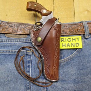 Funda de cuero estilo western para revólver Smith & Wesson, modelo 34, calibre .22 DA, para diestros, color marrón, hecha a mano por el vendedor en EE. UU. Cuero curtido vegetal de 8 onzas.