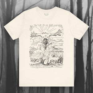 May include: A white t-shirt with a black and white illustration of a person with branches for arms, standing in a landscape with clouds and a sun. The text "Black Mass Apparel" is printed on the shirt.