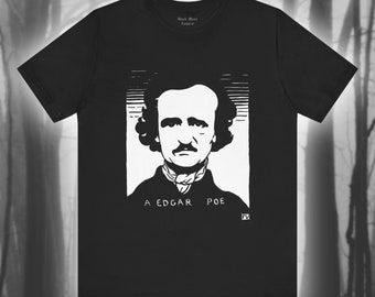May include: Black t-shirt featuring a white illustration of Edgar Allan Poe's portrait and the text "A Edgar Poe".